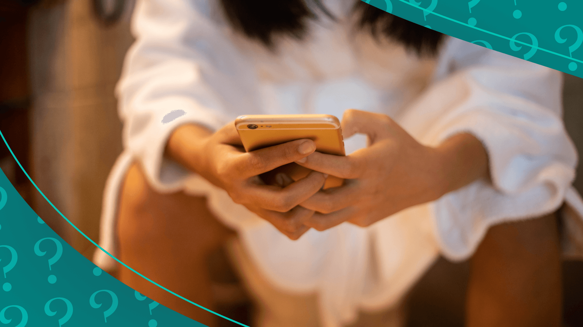 Woman blurry sitting on toilet in robe on phone