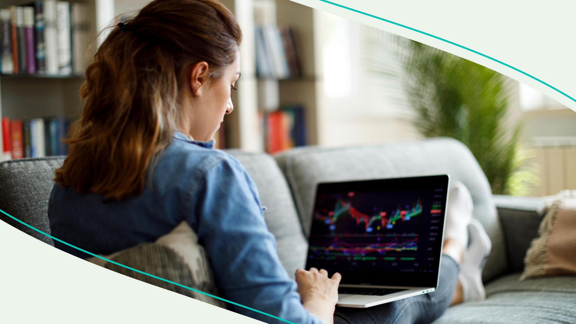 A woman looking at cryptocurrency prices on a laptop