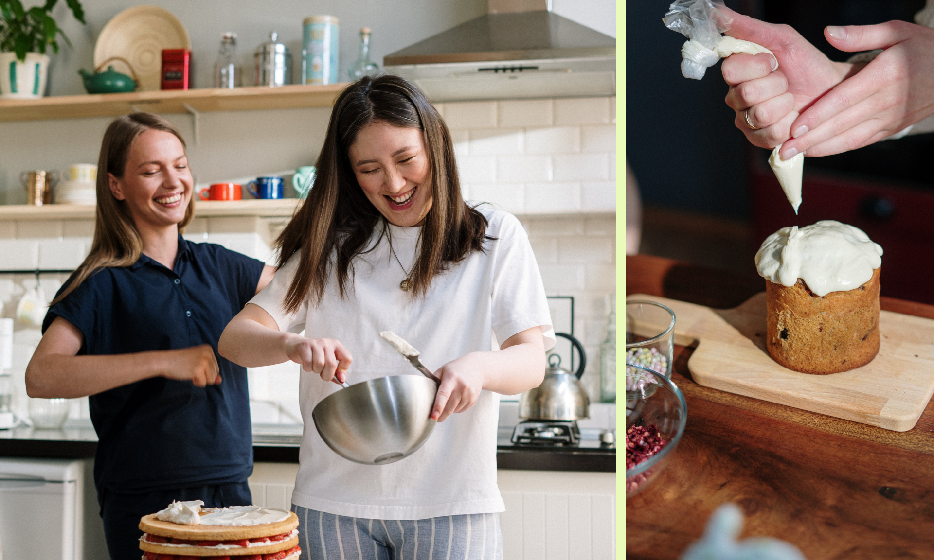 Two women in the kitchen baking together next to a small cake being iced