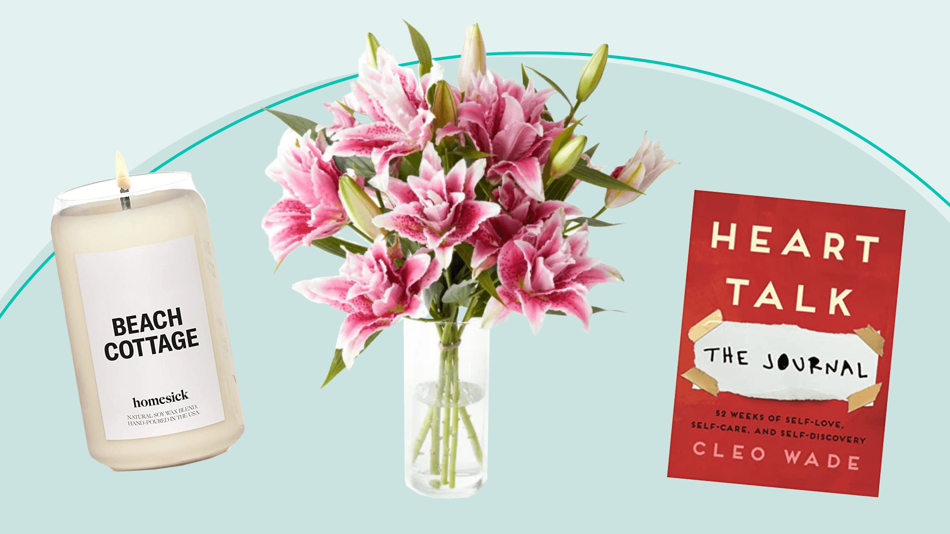 A candle, bouquet of pink flowers, and book on heartbreak