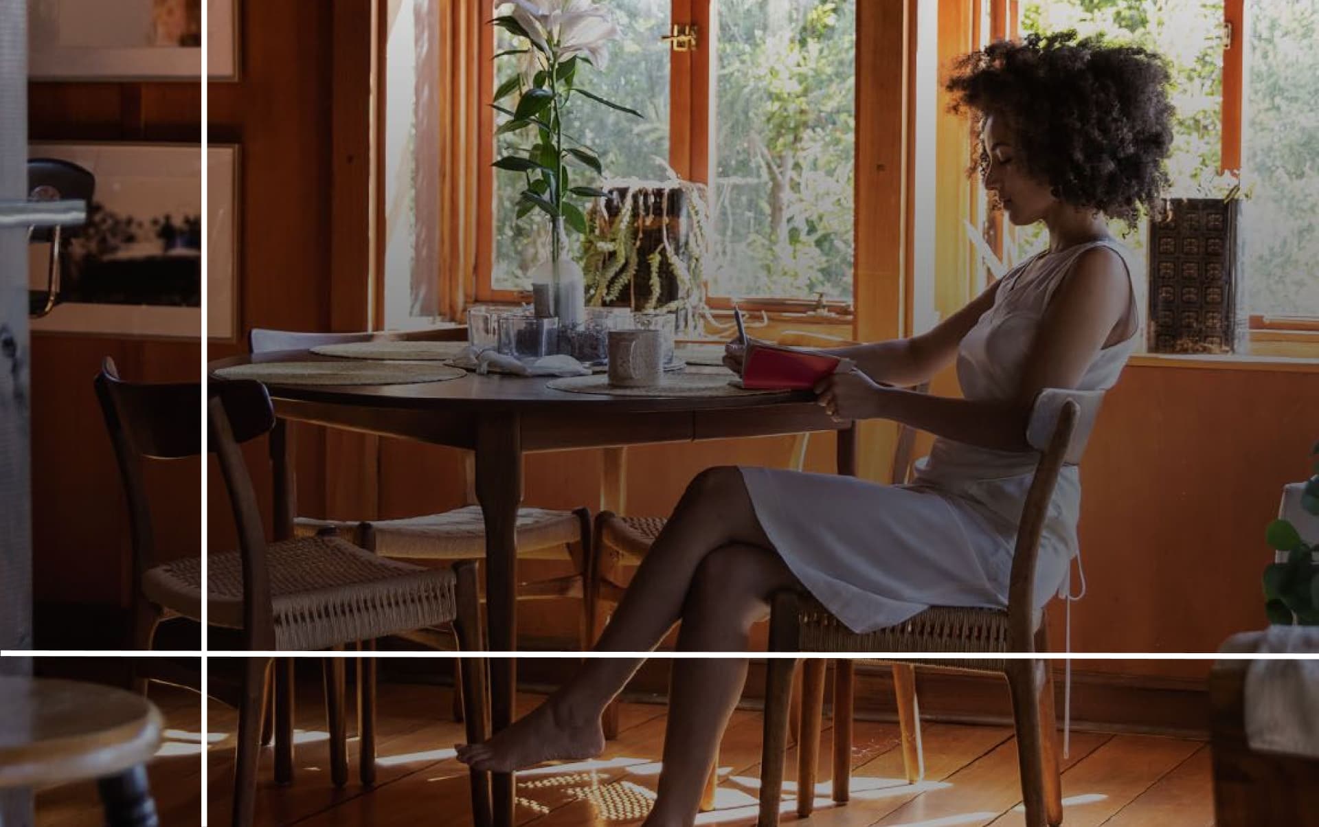 woman sitting at her desk. writing