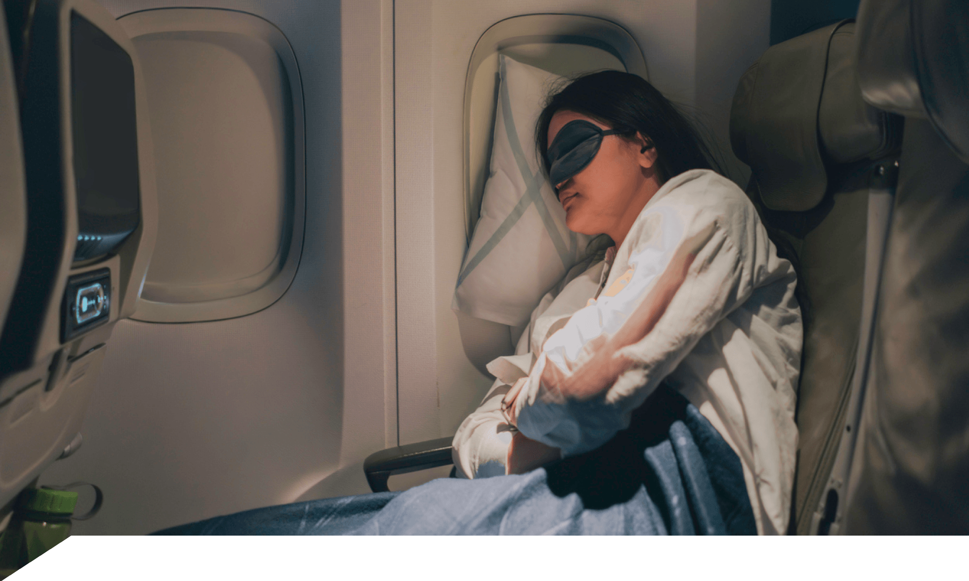 Woman sleeping on an airplane